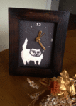 白フワ猫時計.gif